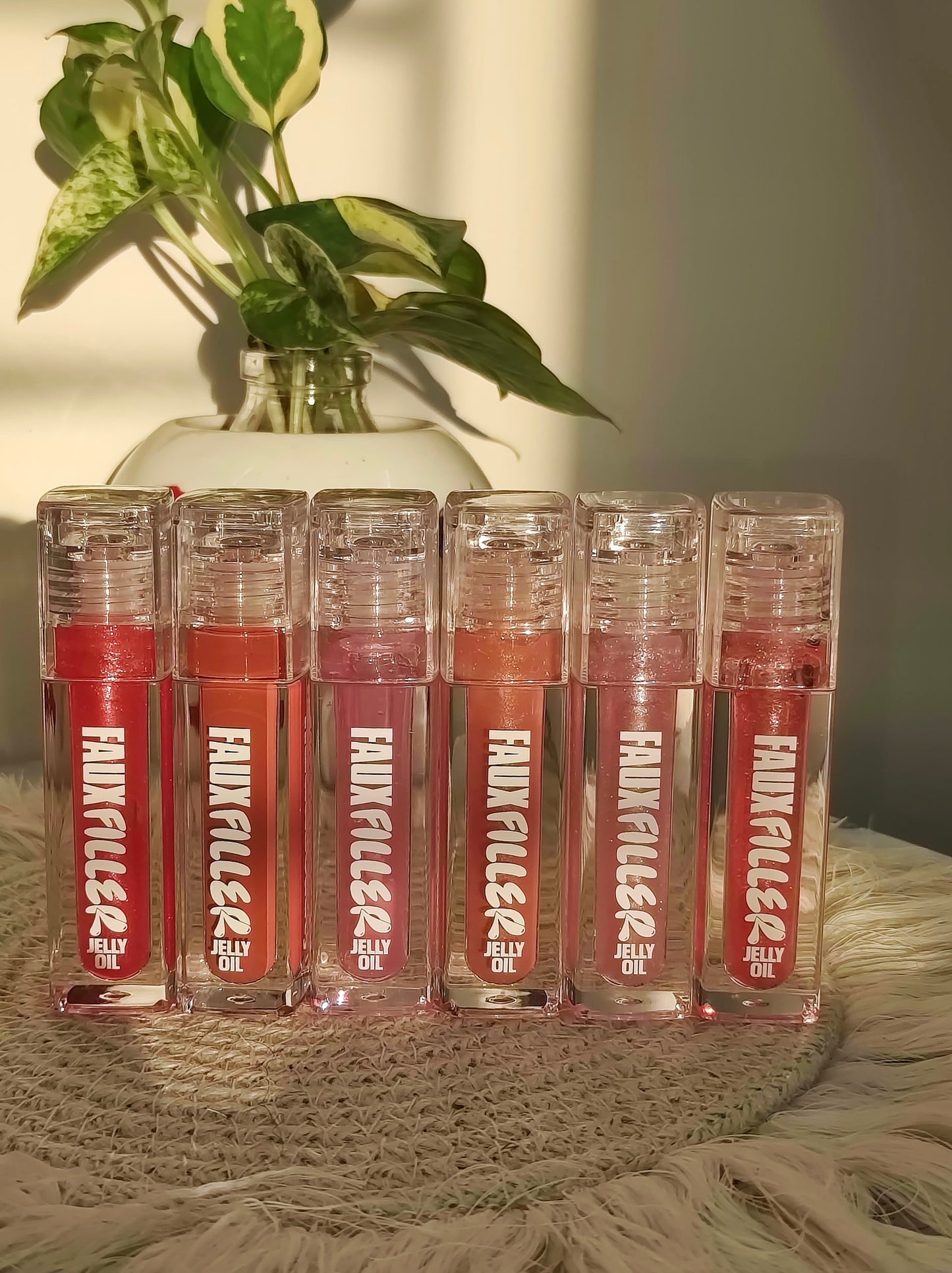 Huda Beauty Faux Filler Tinted Jelly Lip Oil